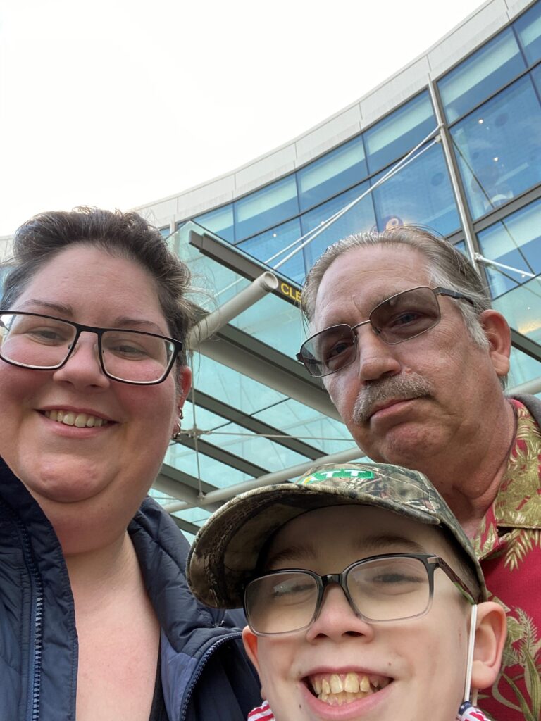 Alex, age 11, with his Aunt Corey and Grandpa